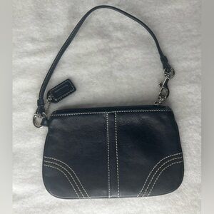 Black leather Coach wristlet